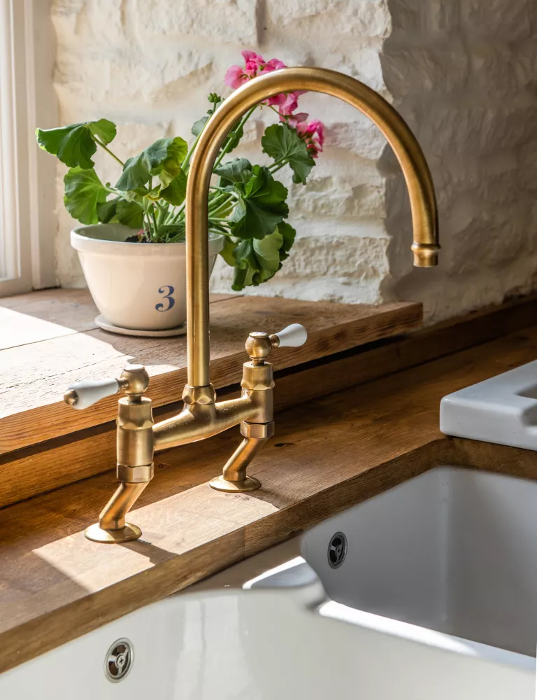 Integrate Antique-Style Brassware For Added Warmth